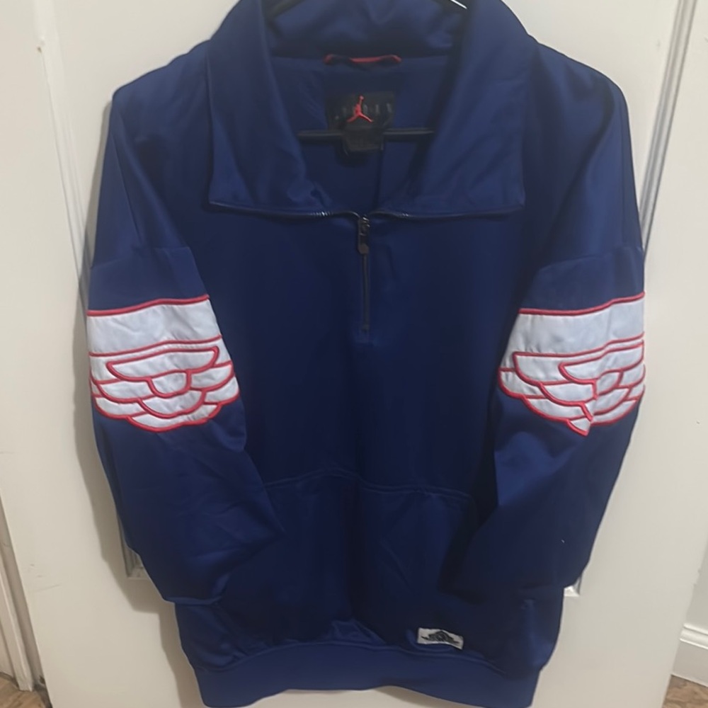 Jordan Blue Jacket with Red and White Details